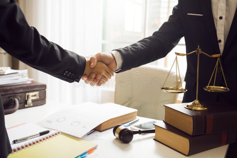 Handshake between attorneys and clients after agreeing royalty free stock photos Handshake between attorneys and clients after agreeing royalty free stock photos