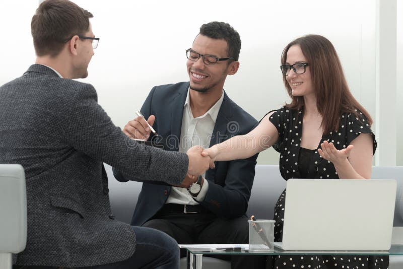 Handshake of business partners after discussing a new joint project. stock photography Handshake of business partners after discussing a new joint project. stock photography
