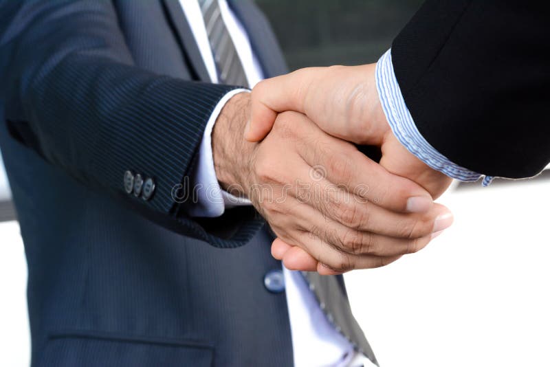 Handshake of businessmen royalty free stock images