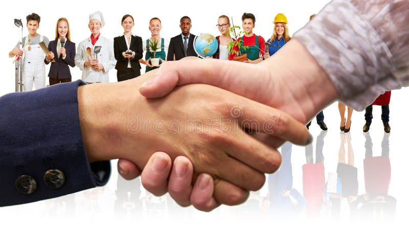 Handshake in front of people from many professions as a personal concept stock photography