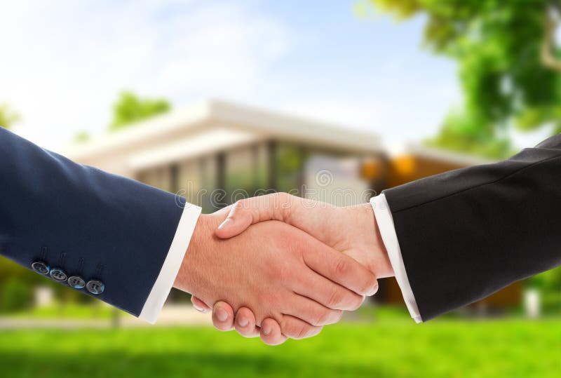 Handshake on house outdoor background