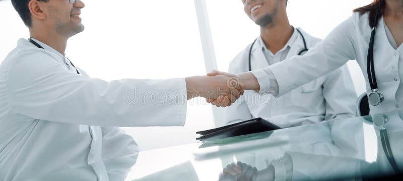 Handshake of medical colleagues at a meeting at the hospital