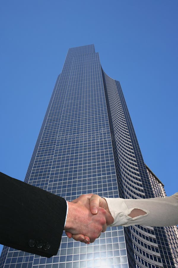 Handshake with skyscraper