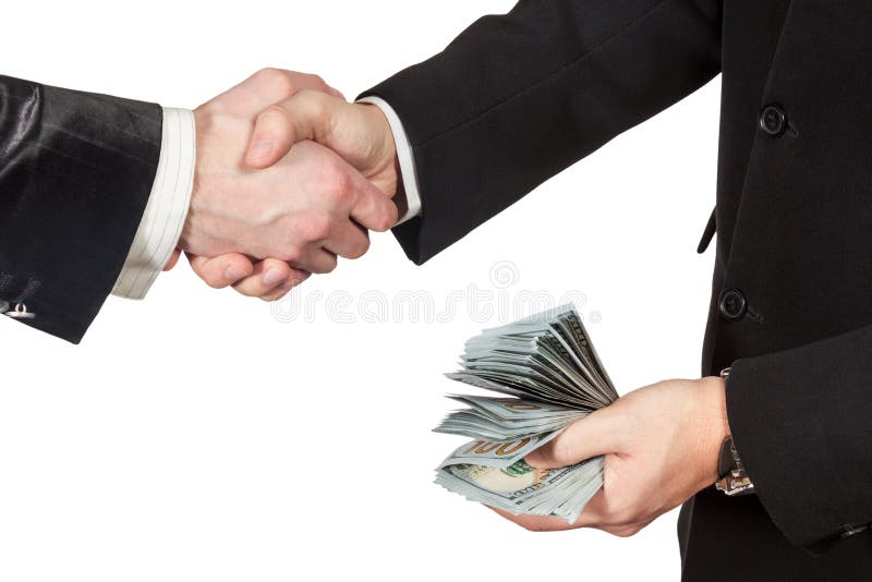 Handshake of two businessmen with money in hand royalty free stock images Handshake of two businessmen with money in hand royalty free stock images