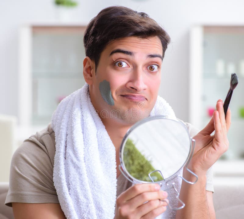 Handsome Applying Clay Mask on Face Stock Image Image of mirror
