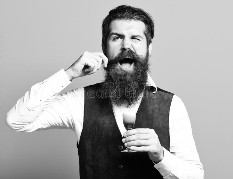 Handsome Bearded Man with Long Beard and Mustache on Funny Face Tasting ...