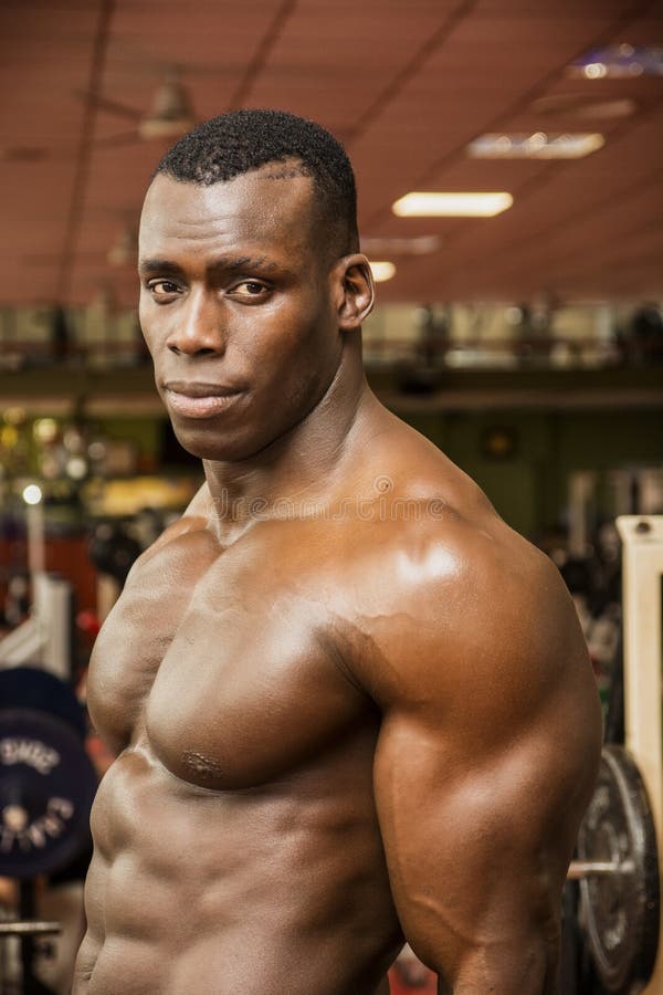 Muscular Athletic Bodybuilder Fitness Model Posing After Exercises In Gym  Stock Photo, Picture and Royalty Free Image. Image 62451450.
