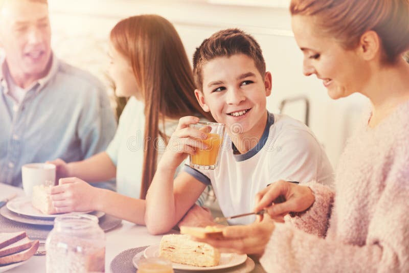 Handsome boy looking at his mother royalty free stock photo Handsome boy looking at his mother royalty free stock photo