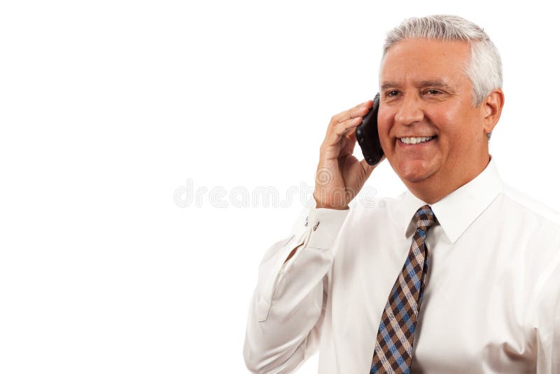 Handsome middle age business man wearing a white dress shirt and neck tie holding a wireless smart telephone on a white background. Handsome middle age business man wearing a white dress shirt and neck tie holding a wireless smart telephone on a white background.