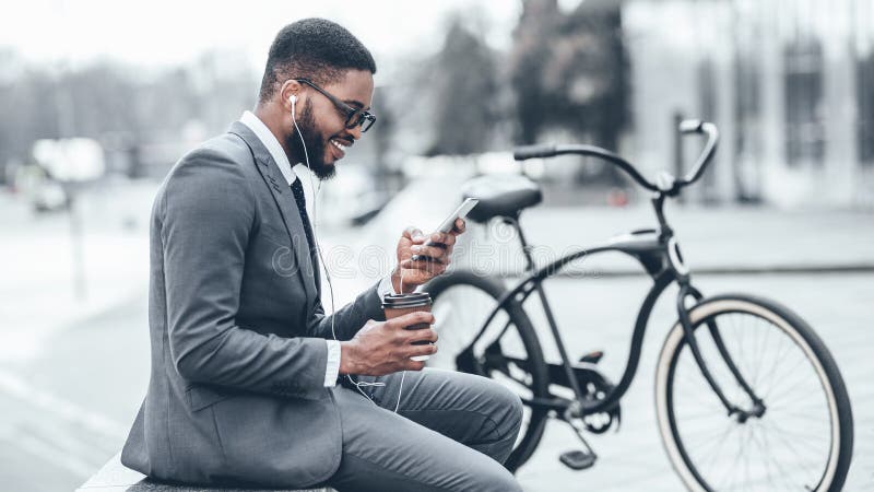 Handsome businessman browsing net during coffee break stock image Handsome businessman browsing net during coffee break stock image