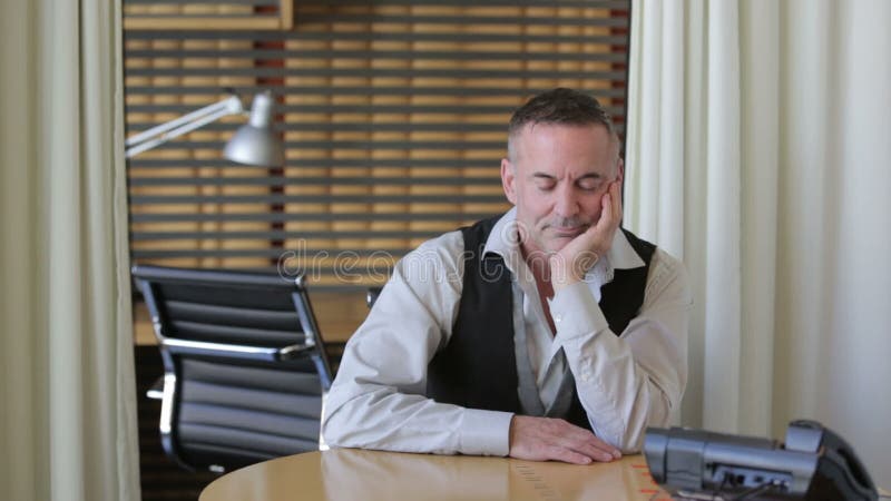 Handsome Businessman Falling Asleep At His Desk Stock Video