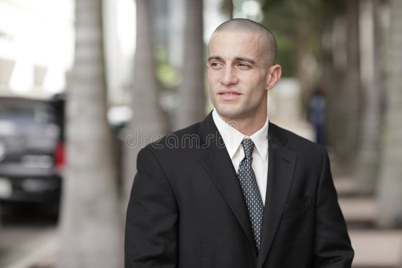 Handsome Businessman with Shaved Head Stock Photo Image of person