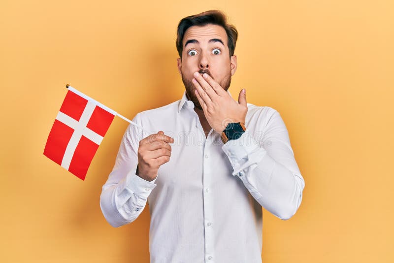 Handsome Caucasian Man with Beard Holding Denmark Flag Covering Mouth ...