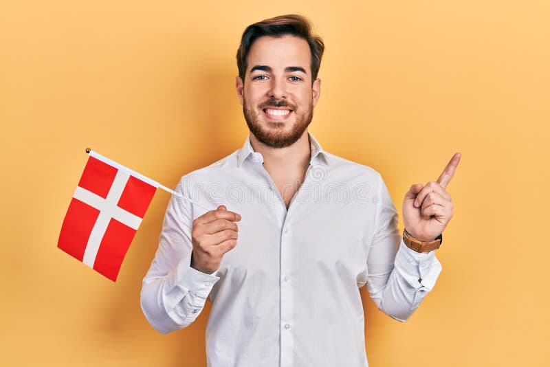 Handsome Caucasian Man with Beard Holding Denmark Flag Smiling Happy ...