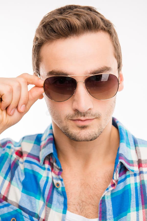 Handsome Cheeky Man Adjusting His Glasses Stock Photo - Image of ...