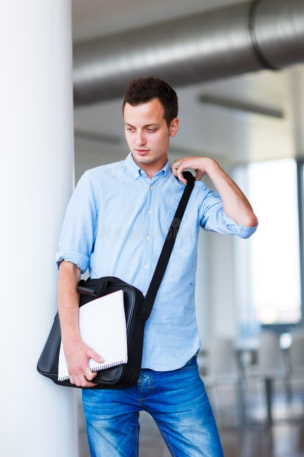 Handsome college student on campus stock image