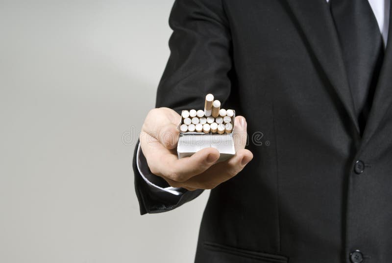 Handsome guy shows cigarettes