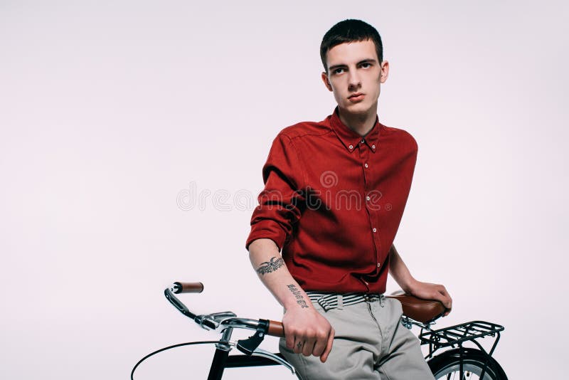 Handsome Guy Standing by Bicycle Stock Photo - Image of studioshot ...