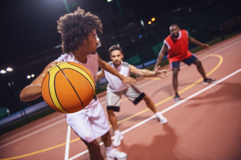 Guys playing basketball stock photo. Image of ball, evening - 302179698
