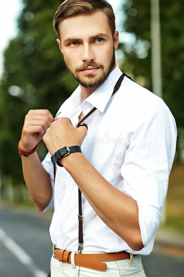 Guy sport outfit. Fashion concept. Man model clothes shop. Sport style.  Menswear and fashionable clothing. Man calm face posing confidently white  background. Man handsome in shirt and shorts Stock Photo - Alamy