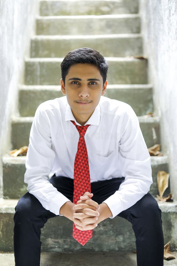 Handsome Indian Young Boy Wearing White Shirt and Red Tie Stock Photo -  Image of cheerful, learners: 208111642