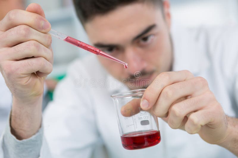 Handsome Male Chemist Setting Up Blood Test Stock Image Image of