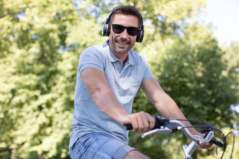 handsome man on a bike. handsome man on a bike