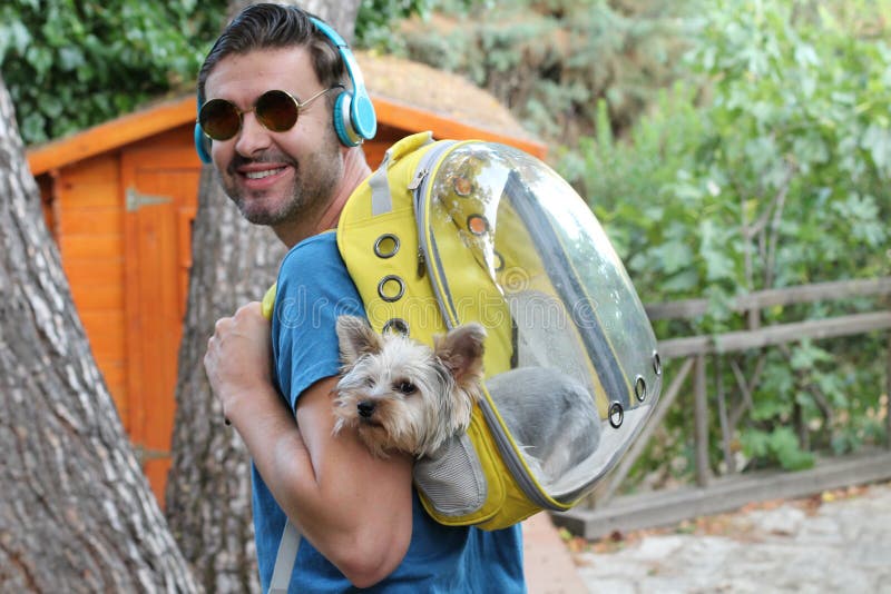 Handsome Man Carrying Dog in a Backpack Stock Image Image of