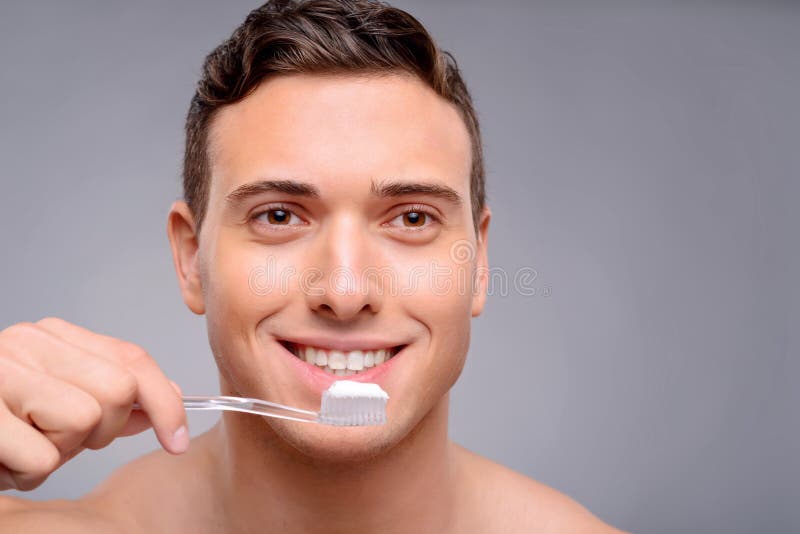 Handsome Man Cleaning Teeth Stock Photo Image of people