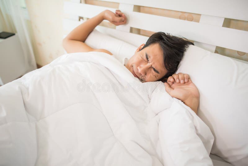 Handsome Man happy waking up royalty free stock image Handsome Man happy waking up royalty free stock image