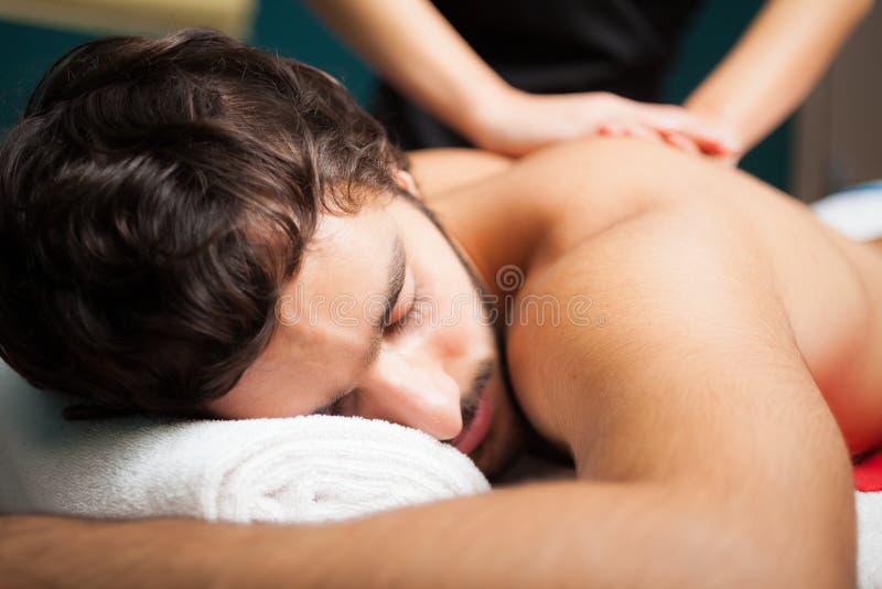 Handsome man having a massage