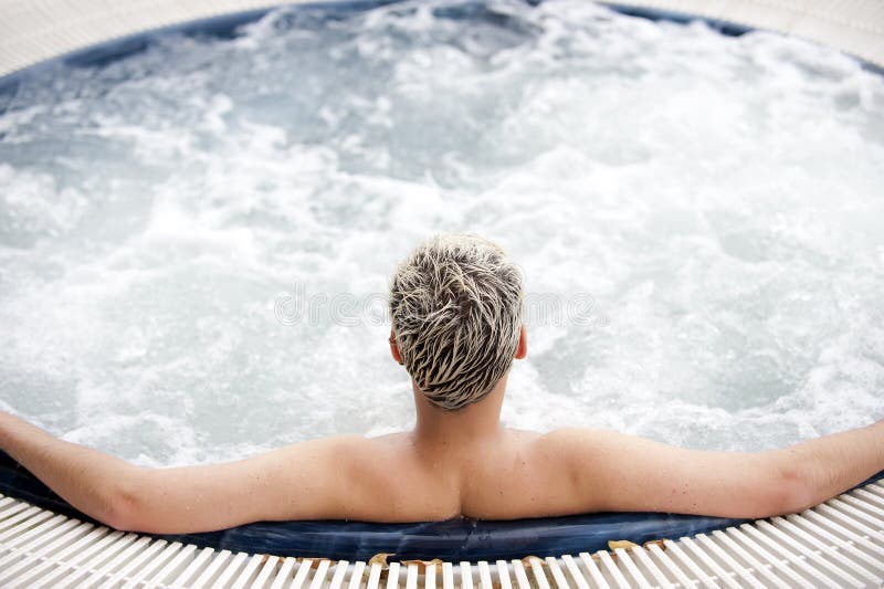 Handsome man in jacuzzi stock image. Image of hair, bubbles 14559705