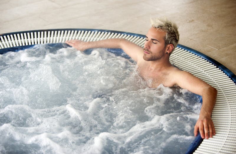 Handsome man in jacuzzi