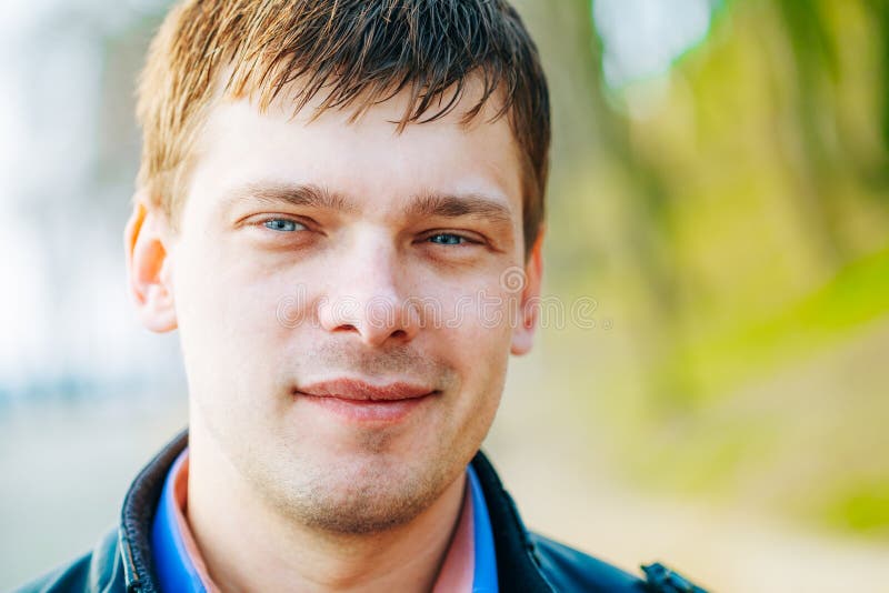 Handsome Man Outdoors Portrait. Spring Colours.