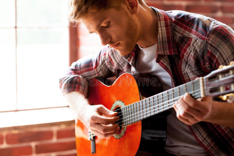 Handsome Man Playing Guitar. Stock Image Image of adult, inspiration