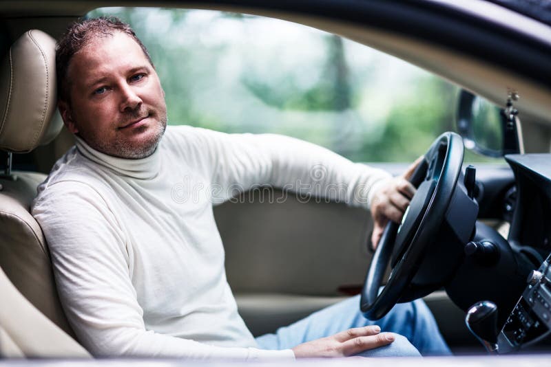 Handsome Man Sitting in the Car Stock Photo - Image of luxury, driving