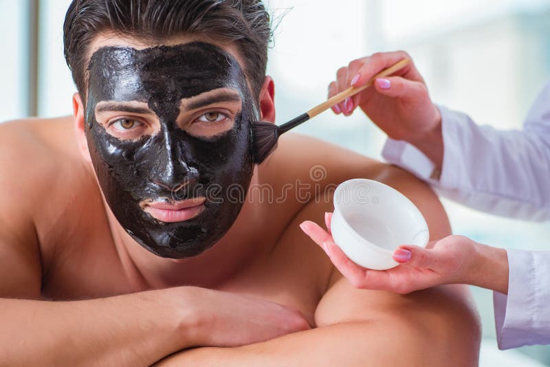 The handsome man in spa massage concept royalty free stock images The handsome man in spa massage concept royalty free stock images