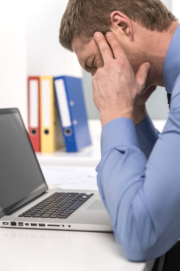 Handsome Man Under Stress, Fatigue and Headache. Stock Photo Image of