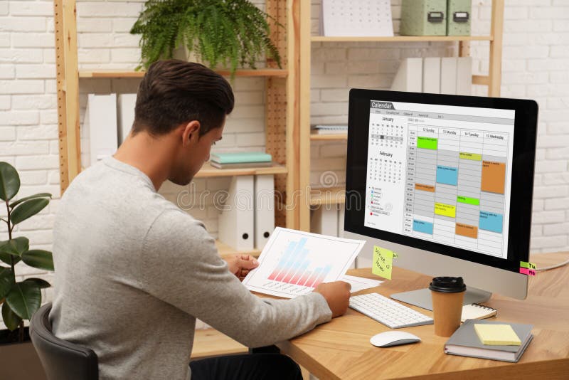 Handsome Man Using Calendar App on Computer Stock Photo Image of agenda planner: 166983466 Handsome Man Using Calendar App on Computer Stock Photo Image of agenda planner: 166983466