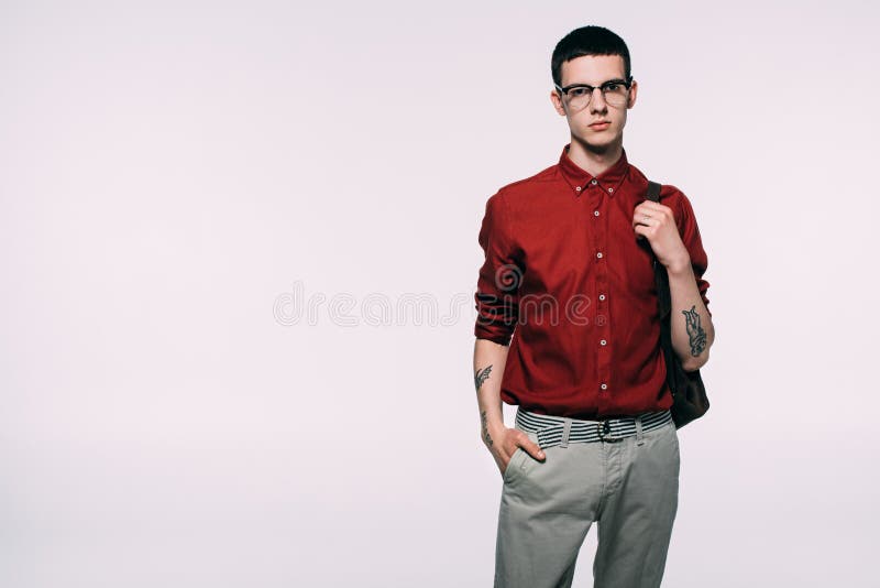 A man with glasses and a red and black shirt photo – Man Image on