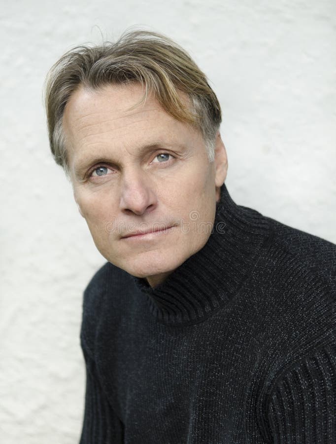 Handsome mature blond man in his forties stock photo
