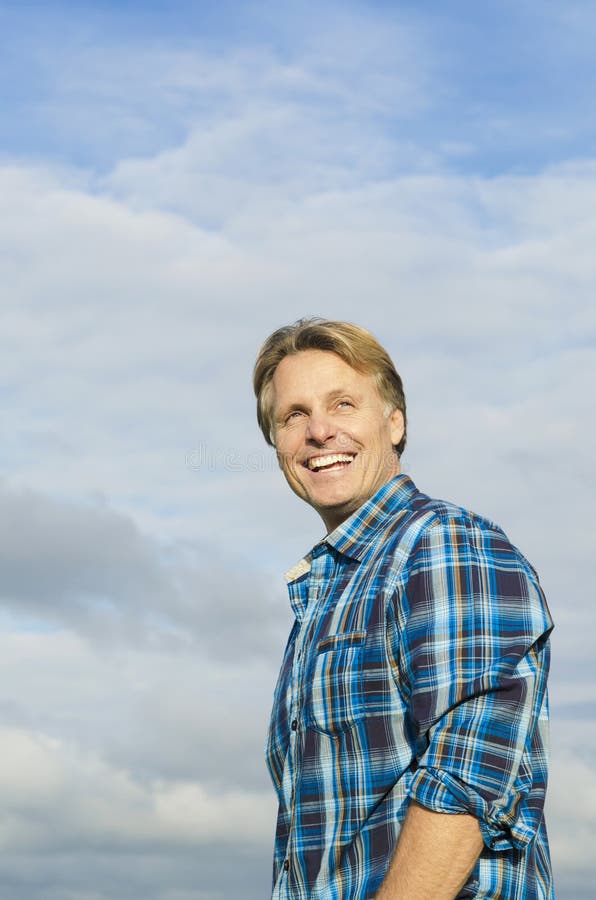 Handsome mature blond man in his forties stock photography