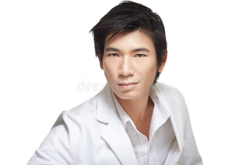 Handsome, mature Chinese businessman in white royalty free stock photography