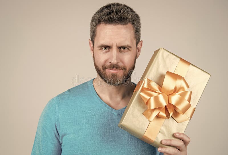 Handsome Mature Man Businessman With Beard Holding Present Or T Box Anniversary Stock Image