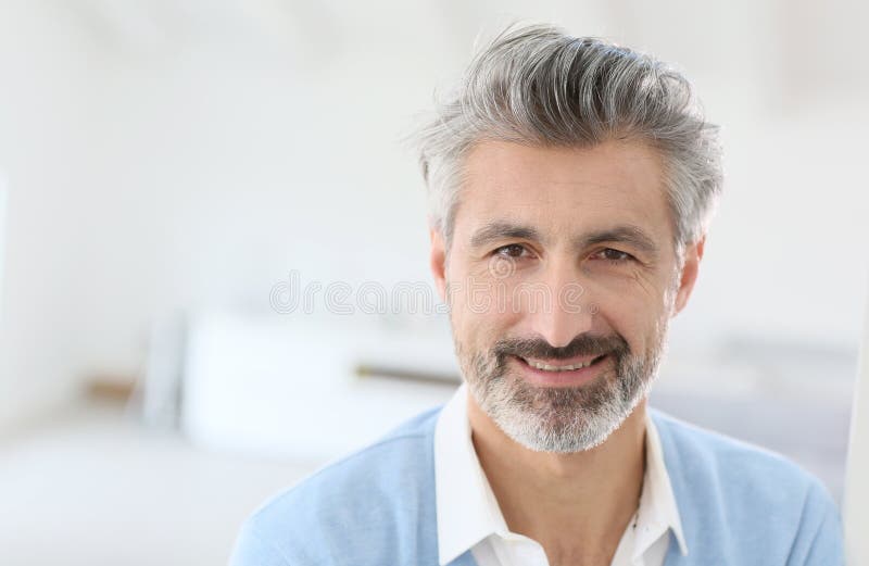 Handsome mature man at home royalty free stock images