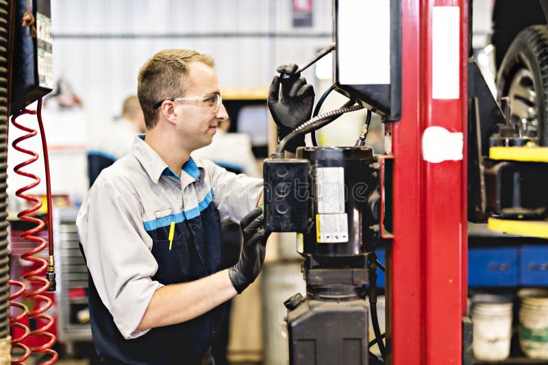 Handsome Mechanic Job in Uniform Working on Car Stock Image Image of