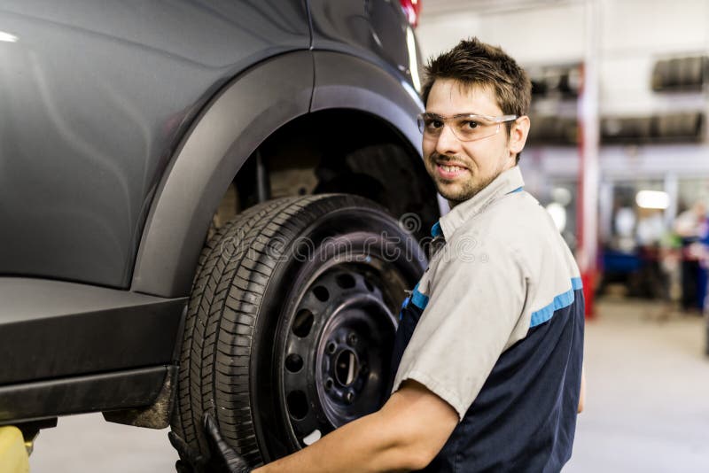 Handsome Mechanic Job in Uniform Working on Car Stock Photo Image of