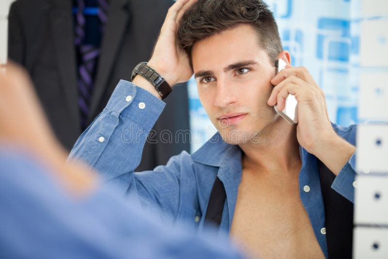 Handsome Men Looking At Himself In Mirror Royalty Free Stock