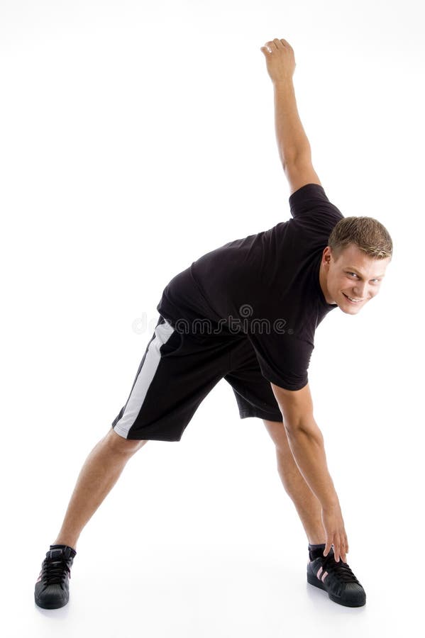 Handsome muscular guy doing exercise