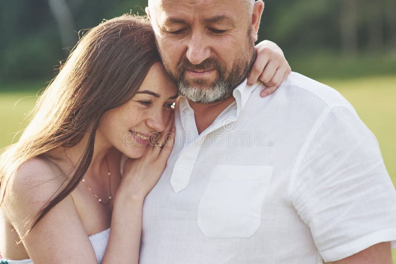 Elderly Man with Gold-digger Companion or Wife Stock Image - Image